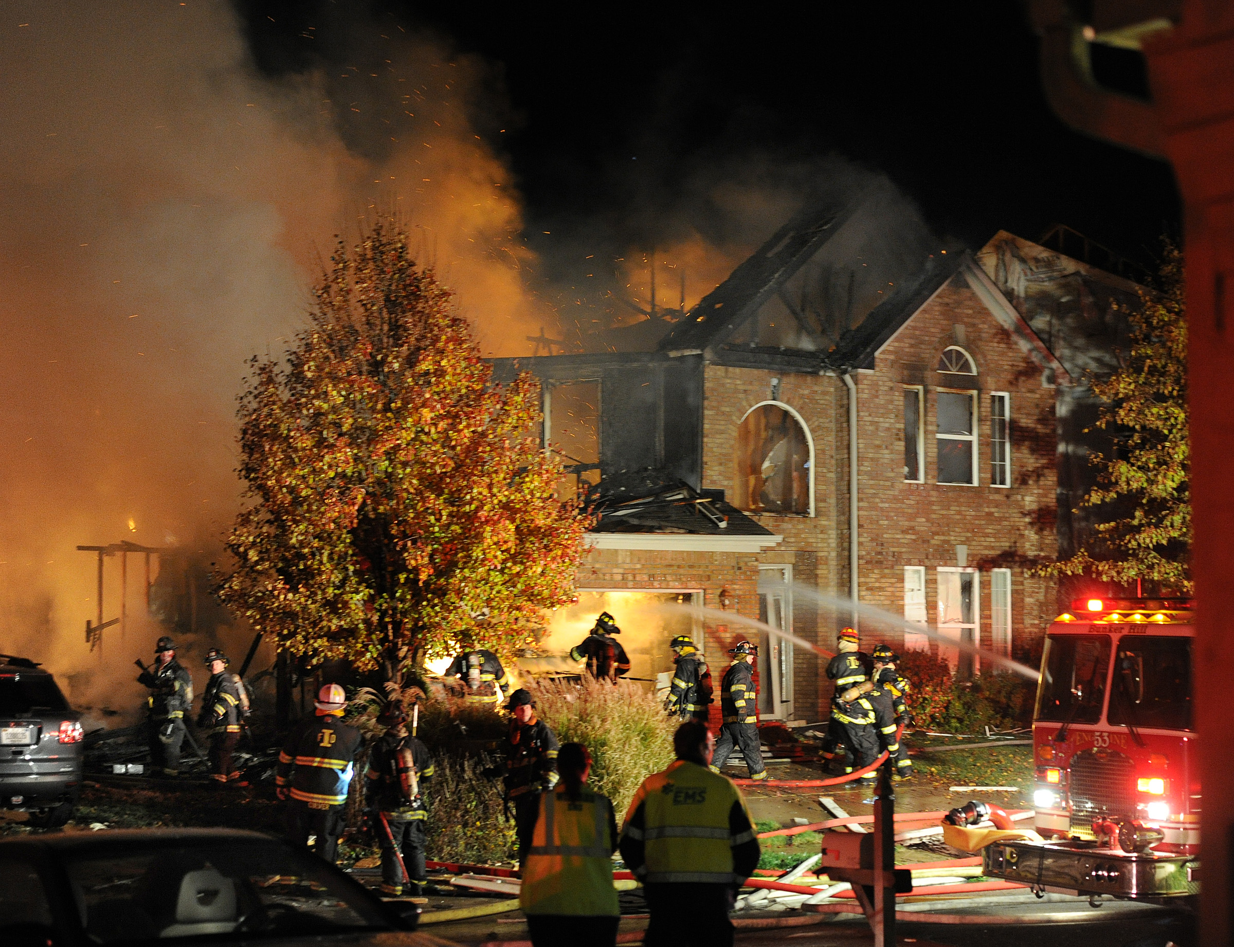 Firefighters on the scene putting out flames engulfing a home in Richmond Hill